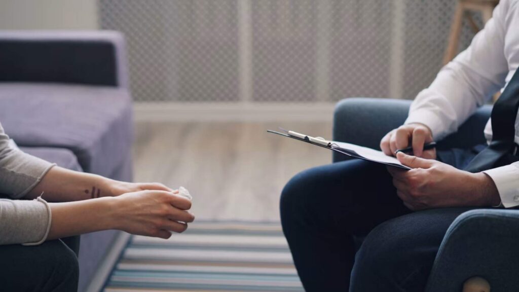 A healthcare provider at Psychiatric Pathways discussing medical options for Ketamine Treatment for Bipolar Disorder in Bloomington, Minnesota with a patient.