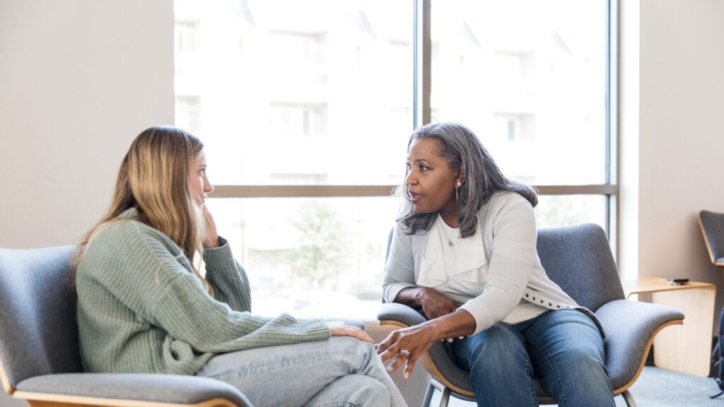 Women talking to brief the patient about Ketamine Therapy for Depression